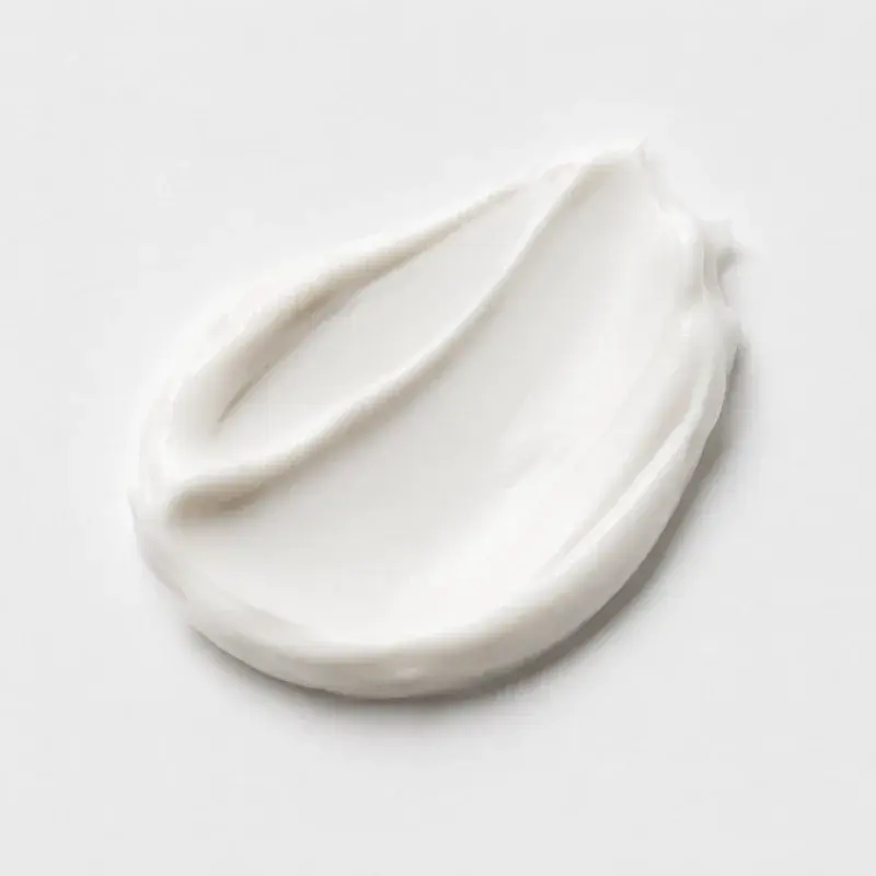 Swatch of cream, illustrating a topical format
